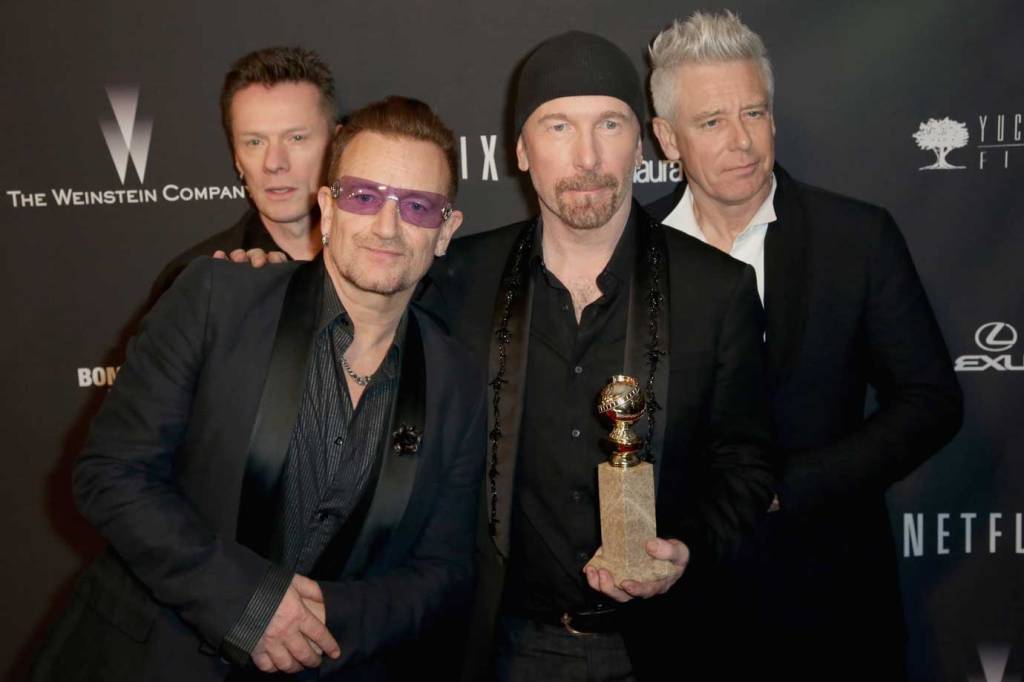 Integrantes do U2, Larry Mullen, Jr.,Bono, The Edge e Adam Clayton, em 2014